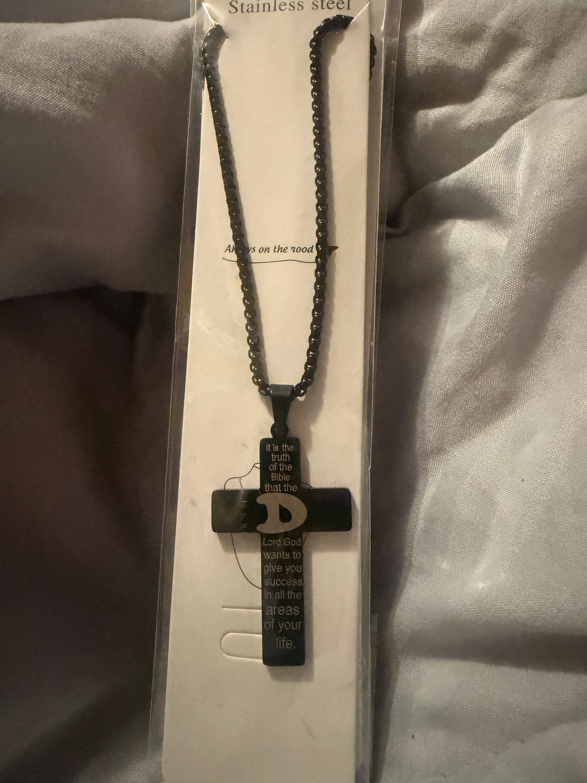 Cross with initial