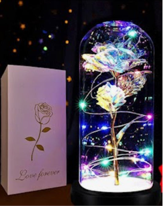 Artificial flower in glass dome
